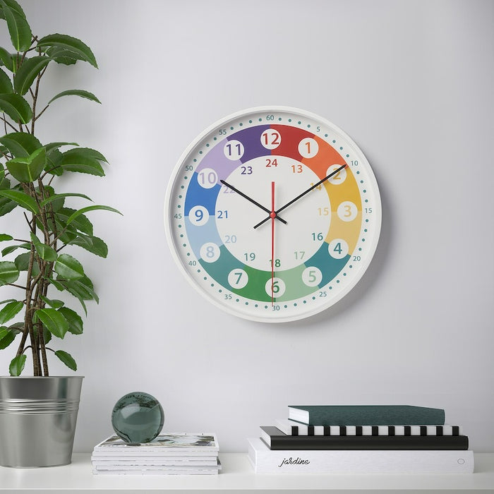 KORVTRAD Wall clock, low-voltage/multicolour, 28 cm