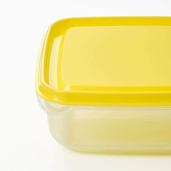 PRUTA Food container, transparent/yellow 0.6 l