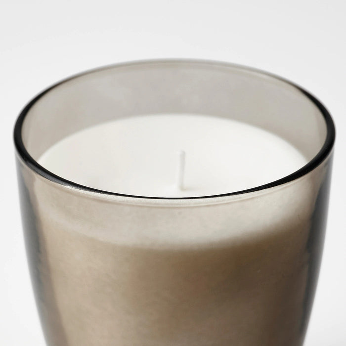 ENSTAKA Scented candle in glass, Bonfire/grey, 50 hr