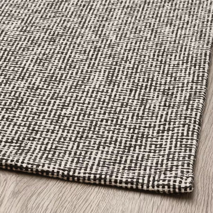 TIPHEDE rug, flatwoven, black/natural, 80x150 cm