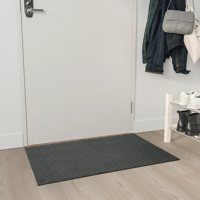 OSTERILD door mat, indoor, dark grey, 60x90 cm